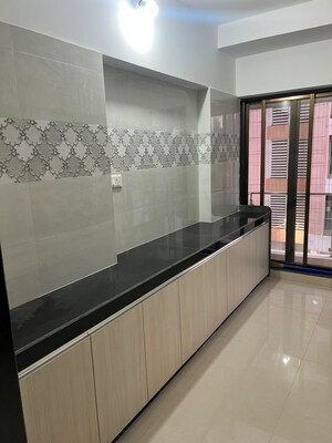 Kitchen in 2 BHK Apartment at Dhariwal Siddharth Nagar Swami Vivekanand CHSL, Goregaon West – for Rent