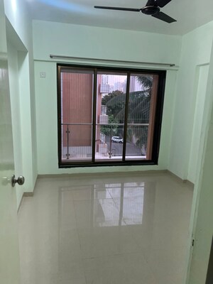 Room in 2 BHK Apartment at Dhariwal Siddharth Nagar Swami Vivekanand CHSL, Goregaon West – for Rent