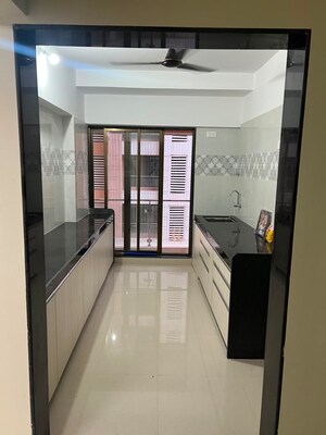 Kitchen in 2 BHK Apartment at Dhariwal Siddharth Nagar Swami Vivekanand CHSL, Goregaon West – for Rent