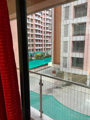 Balcony in 2 BHK Apartment at Dhariwal Siddharth Nagar Swami Vivekanand CHSL, Goregaon West – for Rent