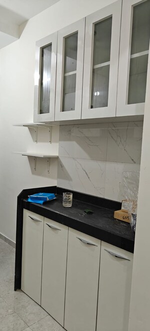 Kitchen in 1 BHK Apartment at Mahavir Kalpavruksha, Ghodbunder Road – for Rent