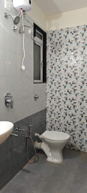 Bathroom in 1 BHK Apartment at Mahavir Kalpavruksha, Ghodbunder Road – for Rent