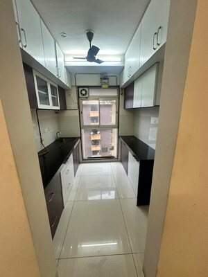 Kitchen in 2 BHK Apartment at Godrej Tranquil, Kandivali East – for Rent