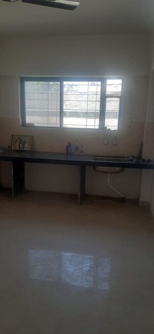 Kitchen in 2 BHK Apartment at Whispering Hills, Undri – for Rent
