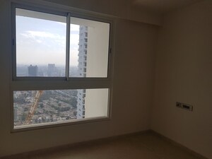 Room in 2 BHK Apartment at Omkar Alta Monte, Malad East – for Rent