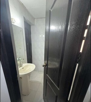 Bathroom in 2 BHK Apartment at Jaipurias Sunrise Greens Zirakpur, Vip Road – for Rent