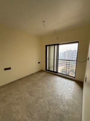 Room in 2 BHK Apartment at IM Applaud 38, Goregaon East – for Sale