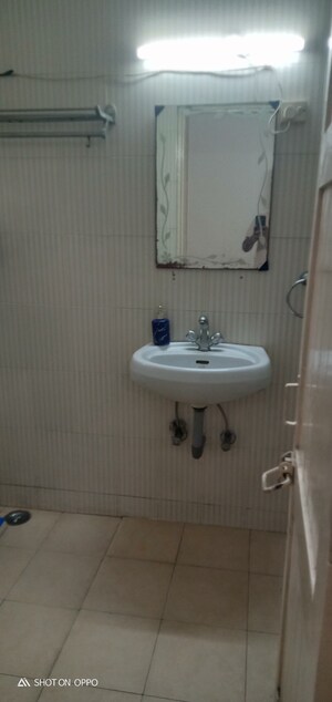 Bathroom in 2 BHK Apartment at Vasant Vihar – for Rent