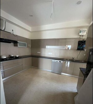 Kitchen in 4 BHK Apartment at Maya Green Lotus Utsav, International Airport Road – for Rent