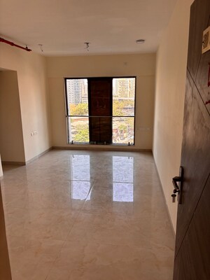 Room in 2 BHK Apartment at IM Applaud 38, Goregaon East – for Rent