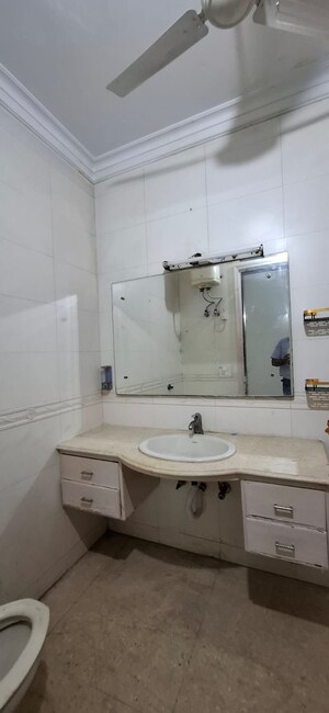 Bathroom in 3 BHK Builder Floor at Pamposh Enclave – for Rent