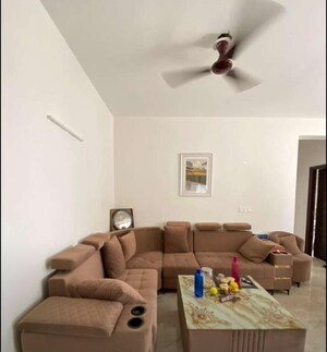 Living Room in 2 BHK Apartment at Artique Uptown Skylla, International Airport Road – for Rent