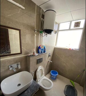 Bathroom in 2 BHK Apartment at Artique Uptown Skylla, International Airport Road – for Rent