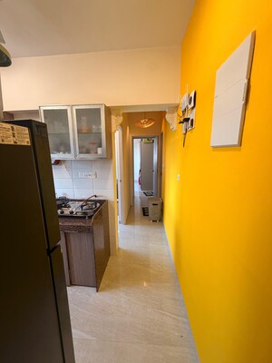 Living Room in 1.5 BHK Apartment at Chandiwala Pearl Heaven, Andheri East – for Sale