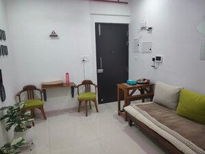 Living Room in 1 RK Apartment at Kolte Patil Vaayu, Dahisar West – for Sale