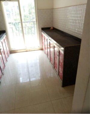 Kitchen in 2 BHK Apartment at Rosa Gardenia, Ghodbunder Road – for Sale