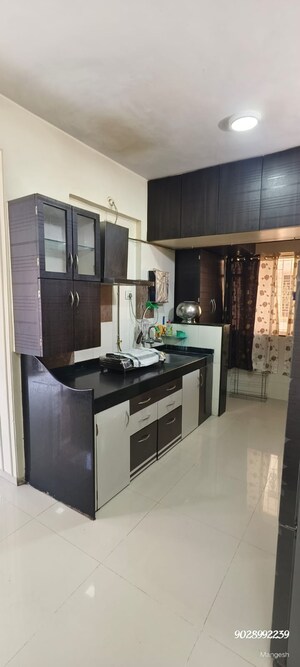 Kitchen in 2 BHK Apartment at Yashada Bluewoods, Pimple Saudagar – for Rent