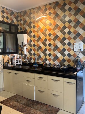 Kitchen in 2 BHK Apartment at Sargam CHS Nanded, Sinhagad Road – for Rent