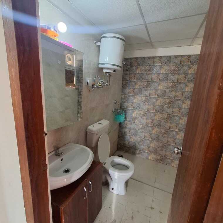 Bathroom, signature-global-the-millennia 2 Bedroom 850 Sq.Ft. Apartment In Sector 37d Gurgaon 10563718