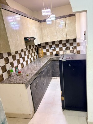 Kitchen in 2 BHK Builder Floor at Dwarka Mor – for Rent