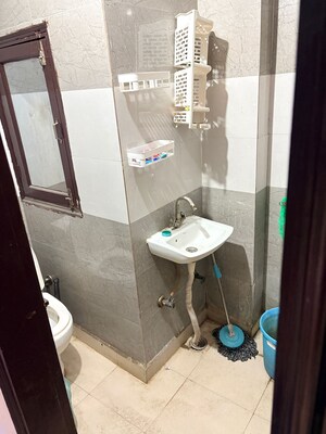 Bathroom in 2 BHK Builder Floor at Dwarka Mor – for Rent