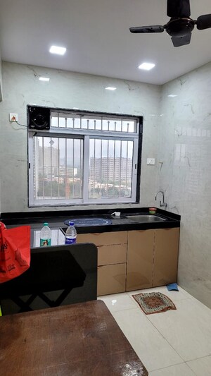 Kitchen in 2 BHK Apartment at Prabhunam Apartment, Chunabhatti – for Sale