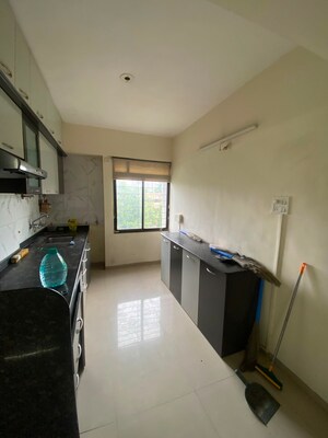 Kitchen in 2 BHK Apartment at Wadgaon Sheri – for Rent
