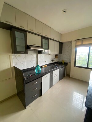 Kitchen in 2 BHK Apartment at Wadgaon Sheri – for Rent