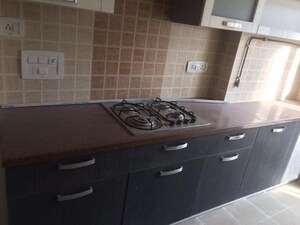 Kitchen in 2.5 BHK Apartment at Prateek Wisteria, Sector 77 – for Rent