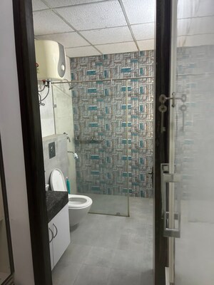 Bathroom in 2.5 BHK Apartment at Prateek Wisteria, Sector 77 – for Rent