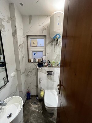 Bathroom in 3 BHK Builder Floor at Smart World Orchard, Sector 61 – for Rent