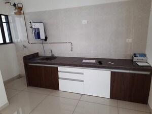 Kitchen in 1 BHK Apartment at Duville Riverdale Heights, Kharadi – for Rent