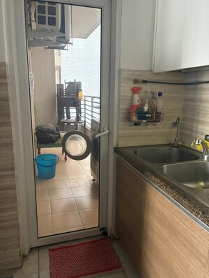 Kitchen in 3.5 BHK Apartment at ABA Cleo County, Sector 121 – for Rent