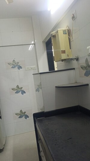 Kitchen in 1 BHK Apartment at Raheja Township, Malad East – for Rent