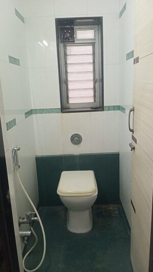 Bathroom in 1 BHK Apartment at Raheja Township, Malad East – for Rent