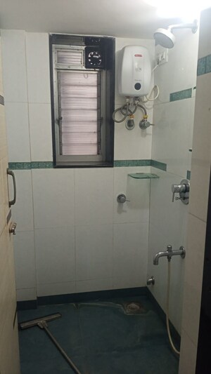 Bathroom in 1 BHK Apartment at Raheja Township, Malad East – for Rent
