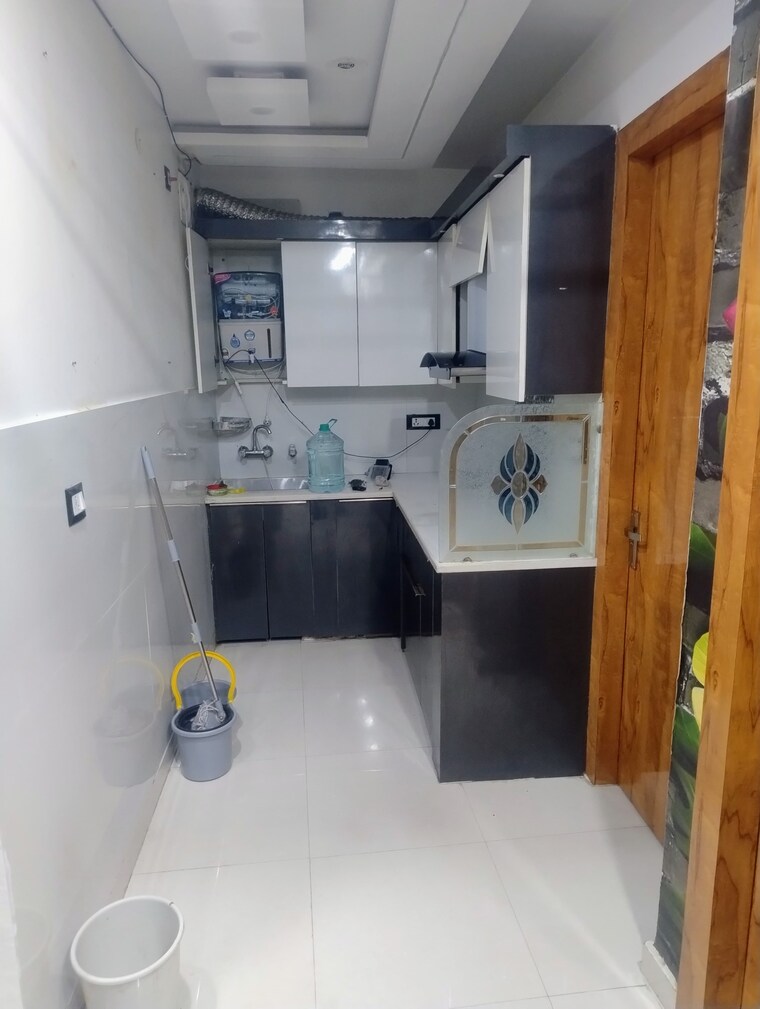 Kitchen, nawada 3 Bedroom 900 Sq.Ft. Builder Floor In Nawada Delhi 10564069