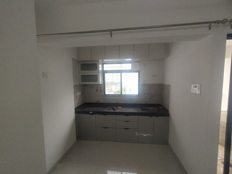 Kitchen, arv-uthville 2 Bedroom 600 Sq.Ft. Apartment In Kharadi Pune 10604332