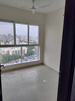 Bedroom in 2.5 BHK Apartment at Dosti Oro 67, Kandivali West – for Sale