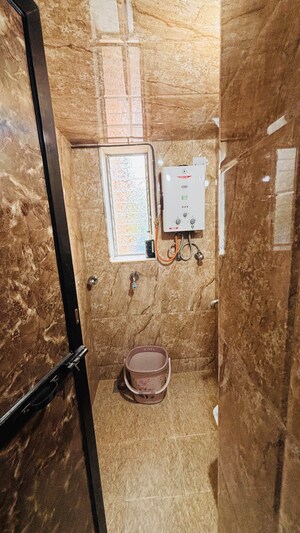 Bathroom in 2 BHK Apartment at Veena Nagar Phase 2 – for Rent