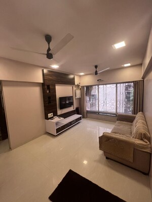Living Room in 1.5 BHK Apartment at Konark Noble Woods, Andheri East – for Sale