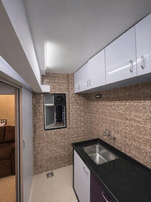 Kitchen in 1.5 BHK Apartment at Konark Noble Woods, Andheri East – for Sale