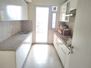 Kitchen in 3 BHK Apartment at DLF The Skycourt, Sector 86 – for Sale