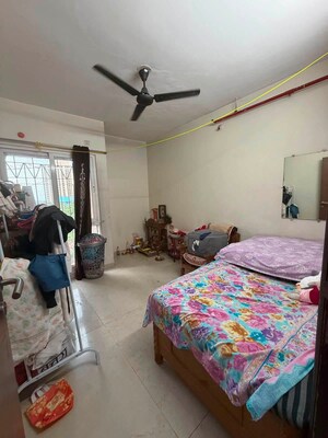 Bedroom in 2 BHK Apartment at Dosti West County Phase 2 Dosti Cedar, Balkum Pada – for Rent