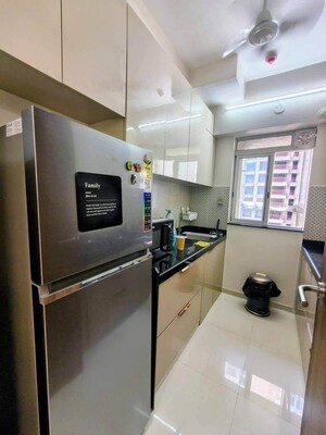 Kitchen in 1 BHK Apartment at Lodha Amara, Kolshet Road – for Sale