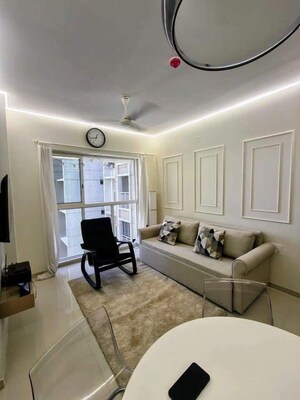 Living Room in 1 BHK Apartment at Lodha Amara, Kolshet Road – for Sale