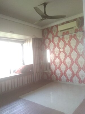 Living Room in 2 BHK Apartment at Happy Home CHS, Kharghar – for Sale