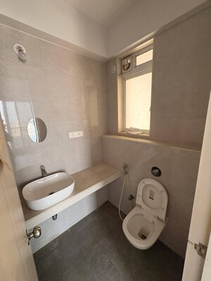Bathroom in 2 BHK Apartment at Sitar Lokpuram CHS, Vasant Vihar – for Sale