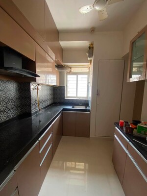 Kitchen in 1 BHK Apartment at Lodha Amara, Kolshet Road – for Sale