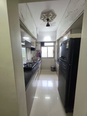 Kitchen in 2 BHK Apartment at RDC Woods Teakwoods, Ghodbunder Road – for Rent